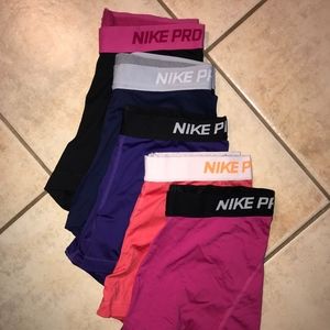 5 PAIRS OF NIKE PRO WOMEN SHORTS